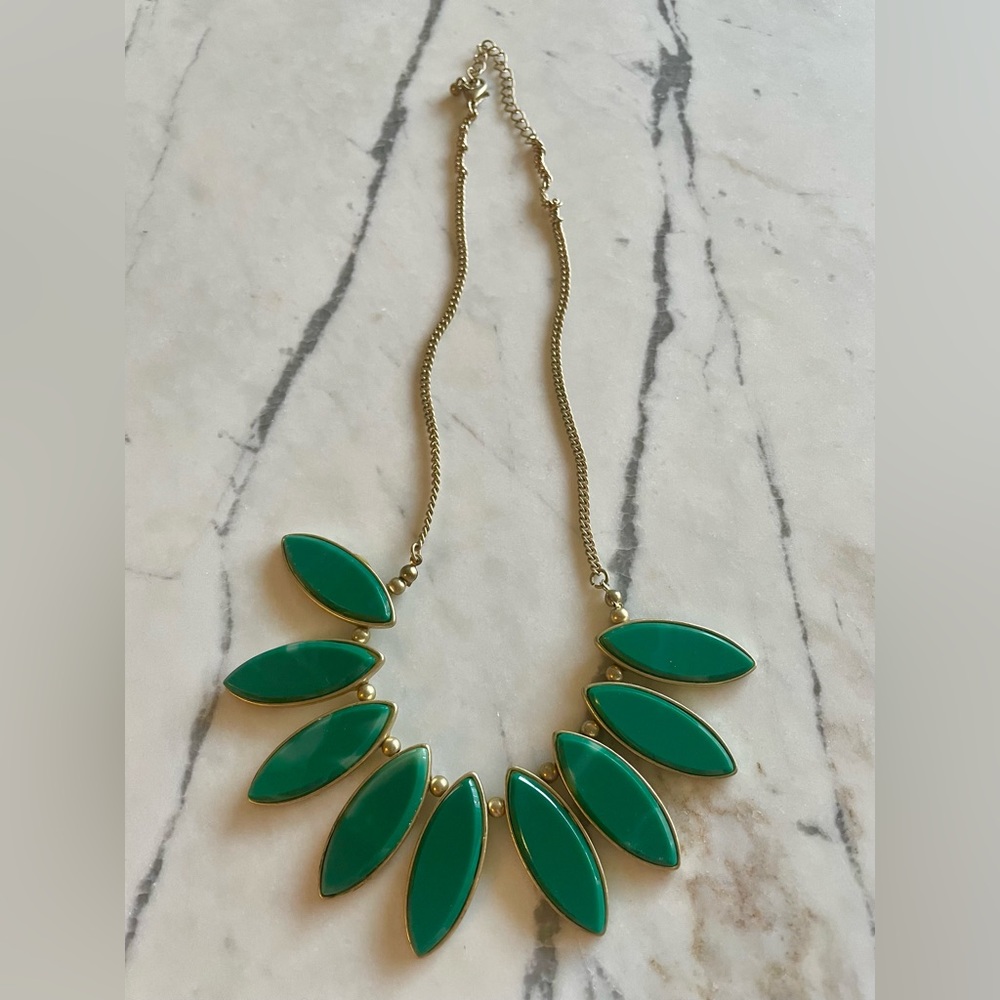 Green necklace with gold chain